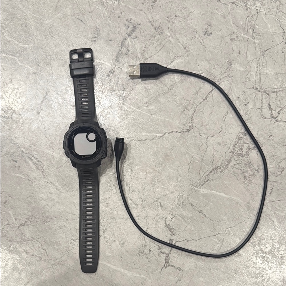 Garmin Instinct Smartwatch with Charging Cable